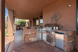View of patio / terrace featuring exterior kitchen