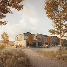 Contemporary house with a garage, driveway, and board and batten siding