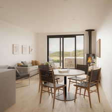 Dining space featuring light wood finished floors