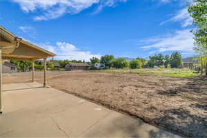 View of yard with a mountain view