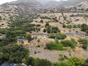 View of mountain backdrop featuring rural landscape