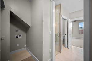 Washroom with electric dryer hookup and hookup for a washing machine