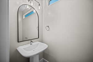 Bathroom featuring healthy amount of natural light