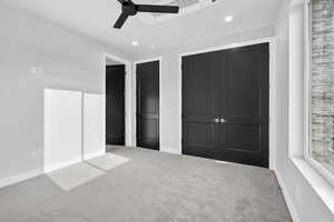 Downstairs ADU. Unfurnished bedroom with carpet flooring, a closet, recessed lighting, and a ceiling fan