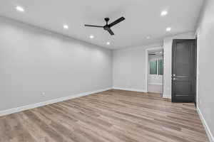 Spare room featuring recessed lighting, light wood finished floors, and ceiling fan