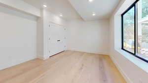 Spare room featuring recessed lighting and light wood-type flooring
