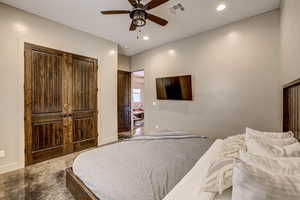 Bedroom featuring a closet, a ceiling fan, and recessed lighting