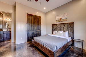 Bedroom featuring a closet, concrete flooring, recessed lighting, and ceiling fan