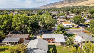 Aerial view of residential area featuring a mountain backdrop