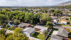 Aerial view of residential area with a mountainous background