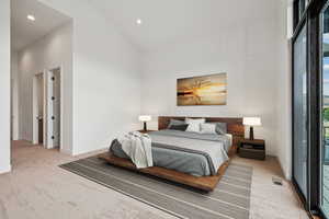 Bedroom featuring light carpet, access to exterior, recessed lighting, and high vaulted ceiling