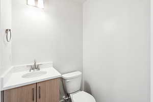 Bathroom with vanity and toilet