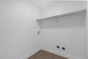 Laundry room with washer hookup, dark wood-style flooring, and hookup for an electric dryer