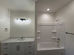 Full bath with vanity and bathing tub / shower combination