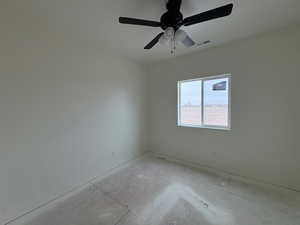 Empty room with a ceiling fan