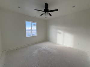 Spare room featuring ceiling fan