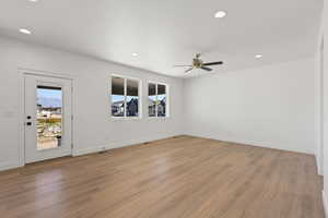 Unfurnished room featuring recessed lighting, light wood-style floors, and a ceiling fan