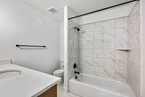 Full bathroom featuring vanity and shower / tub combination
