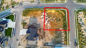 Aerial view of property and surrounding area featuring property parcel outlined