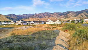View of mountain backdrop with nearby suburban area