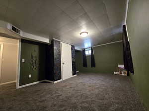 Below grade area featuring carpet flooring