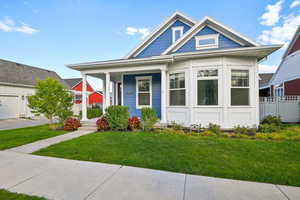 View of front of home featuring covered porch