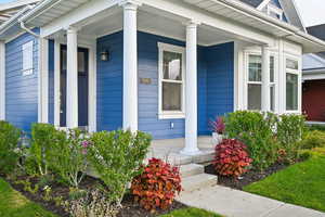 Doorway to property with a porch