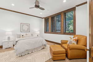 Bedroom featuring carpet floors, ornamental molding, a ceiling fan, and recessed lighting