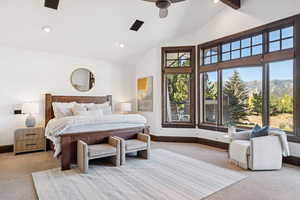 Bedroom featuring light carpet, recessed lighting, a mountain view, ceiling fan, and high vaulted ceiling