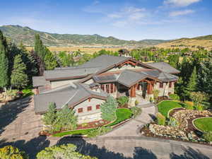 View from above of property featuring a mountainous background