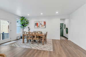 Dining area featuring recessed lighting and wood finished floors