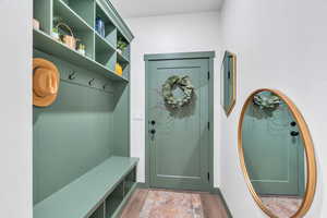 Mudroom with wood finished floors