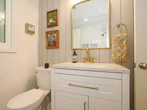 Bathroom with vanity and a shower with curtain