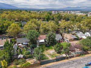 Aerial view of residential area featuring mountains