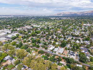Aerial overview of property's location featuring a mountain backdrop
