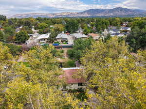 Aerial perspective of suburban area featuring mountains