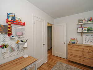 Bedroom with light wood-style flooring