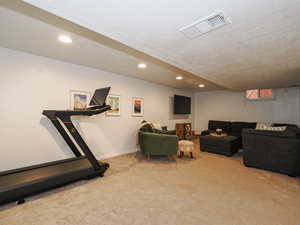 Workout room featuring recessed lighting and carpet floors