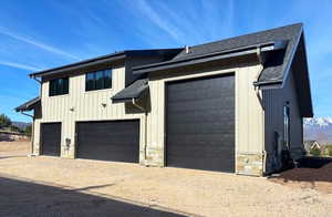 Fully completed Motor Coach/RV plus 3-car garage. Fully Heated plus electric charging station