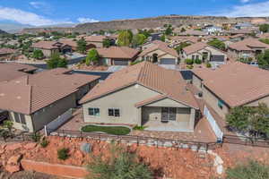 Aerial perspective of suburban area with a mountain backdrop
