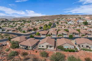 Aerial view of residential area with a mountainous background