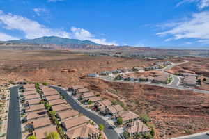 View of property location with a mountainous background and nearby suburban area