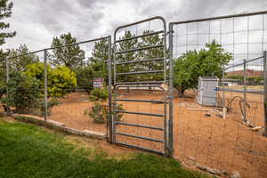View of yard with a gate