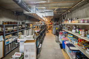 Storage area featuring water heater