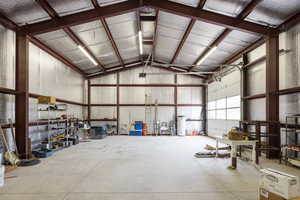Garage featuring metal wall