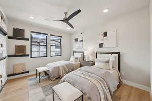 Bedroom featuring ceiling fan, light wood-style flooring, and recessed lighting