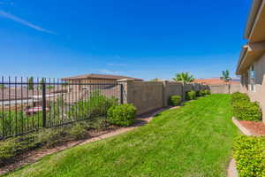 View of fenced backyard