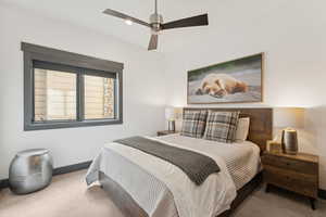 Bedroom with carpet, a ceiling fan, and recessed lighting