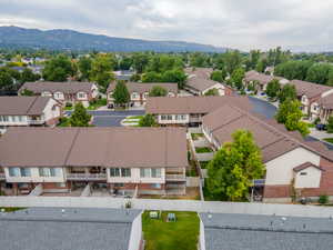 Aerial view of residential area with a mountainous background