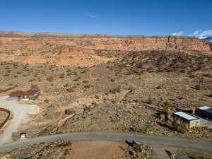 Aerial view of property's location with mountains and rural landscape